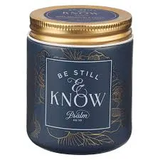 Be Still and Know Golden Rose Nordic Seaside Scented Candle in a Blue